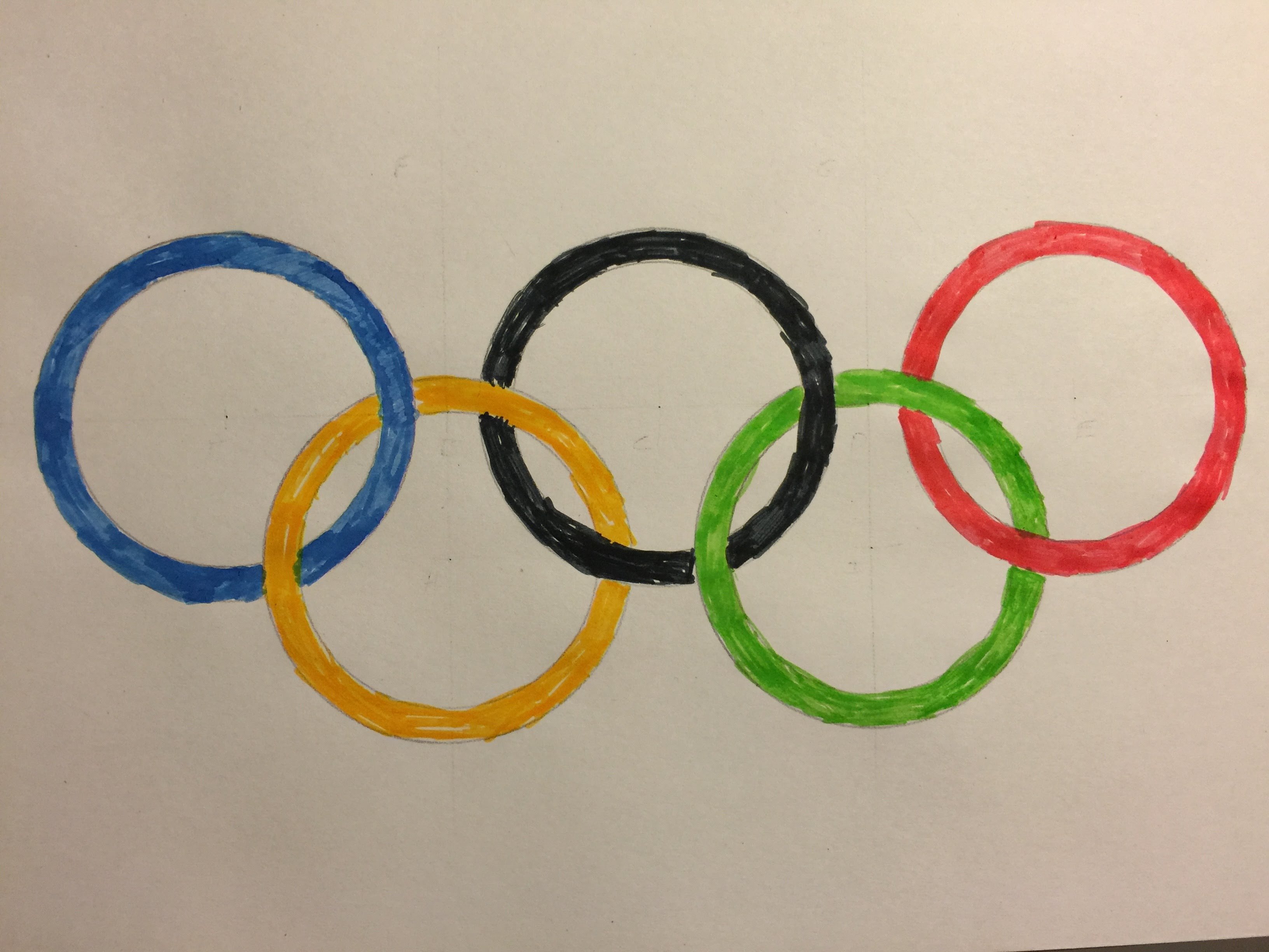 Олимпийские игры рисунок легко. Олимпийские кольца рисунок. Рисование Олимпийские кольца. Олимпийские кольца рисовать.