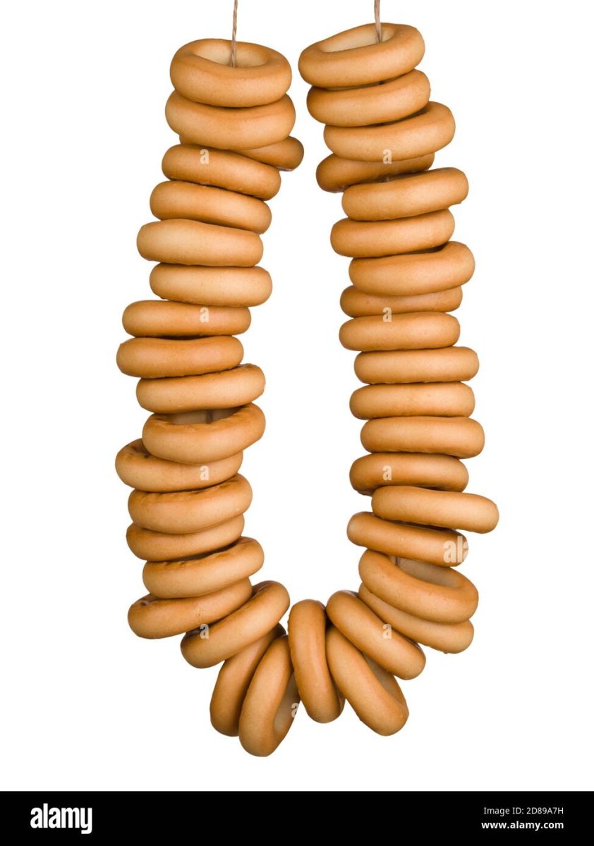 Сушка с тарелками на белом фоне