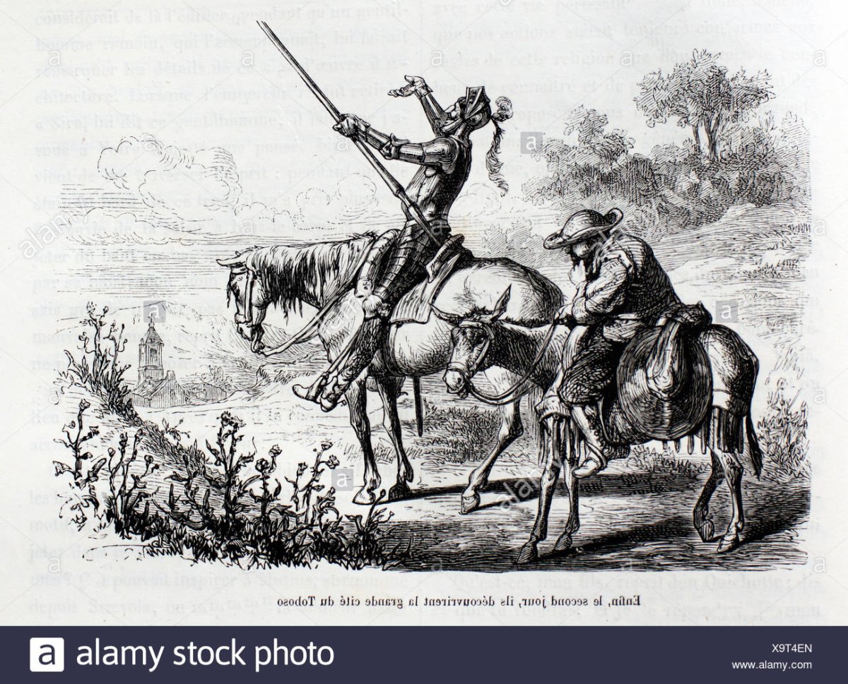 Дон Кихот сидит на столе