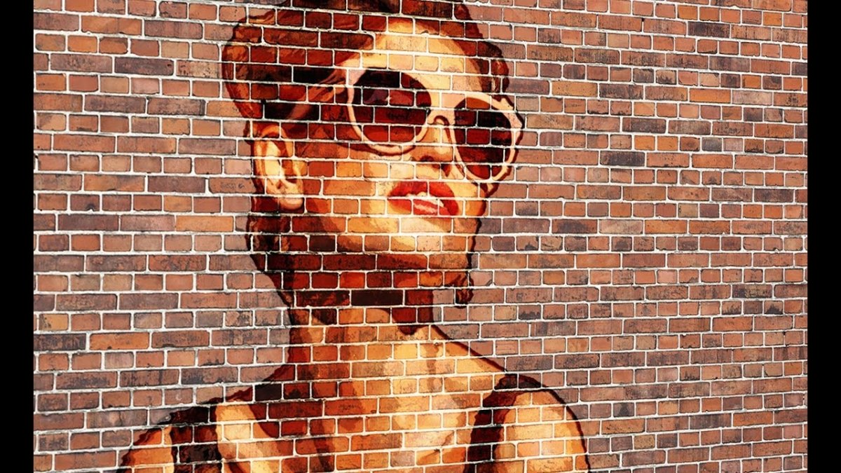 Картина на кирпичной стене